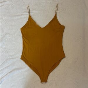 Yellow One Piece Bodysuit